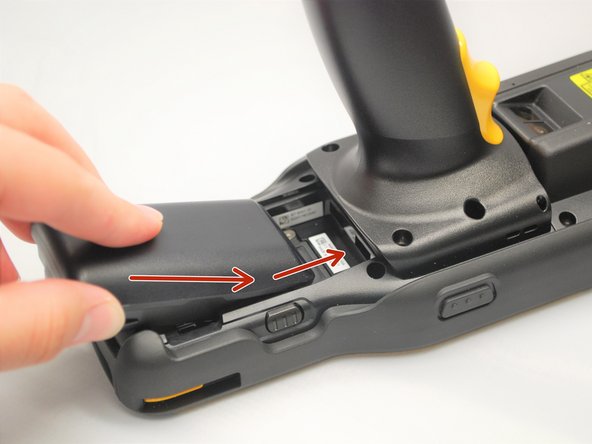 Slide in the battery towards the front of the mobile computer.