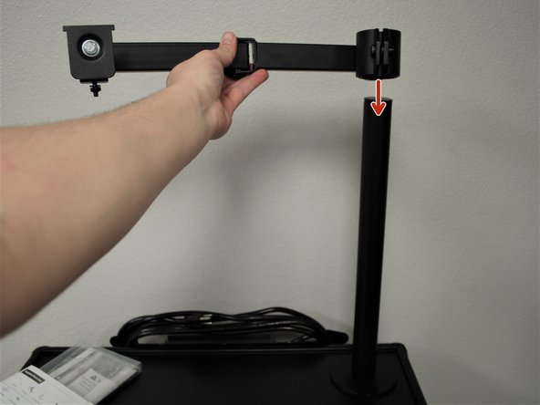 Slide the Swivel Arm over the Support Beam to the desired height.