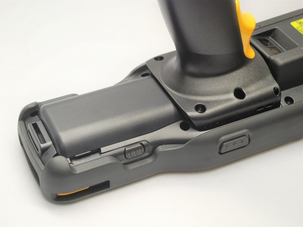 Once the battery pack has slid in all the way, press down on it to lock it in place.