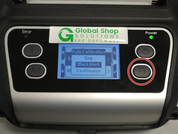 Use the Menu button to scroll down to the &quot;Black Mark&quot; option, then press the Feed button to confirm.