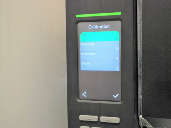 If they don't, open the printer, release and lift the printhead, and pull the labels forward until they line up. as shown in Step 6 Image 3