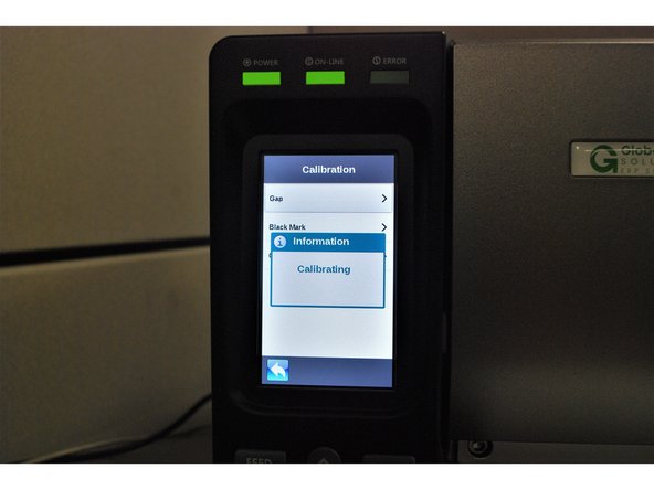 On the printer screen, select &quot;Calibrate,&quot; and then &quot;GAP.&quot;