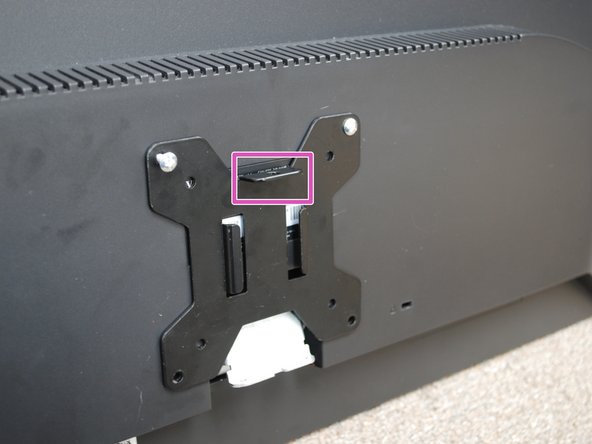 Place the VESA Plate provided over the holes.