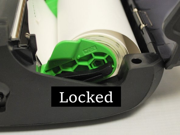 The upper position is unlocked, and allows the holders to be moved.