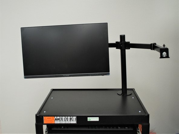 Tighten the bolt shown to set the monitor in place. This will stop it from falling on it's own.