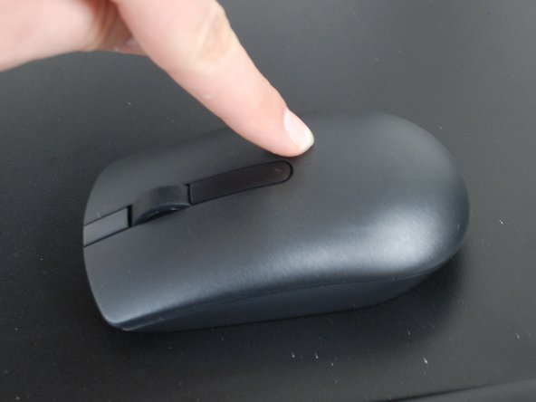 Put the mouse cover back onto the mouse.