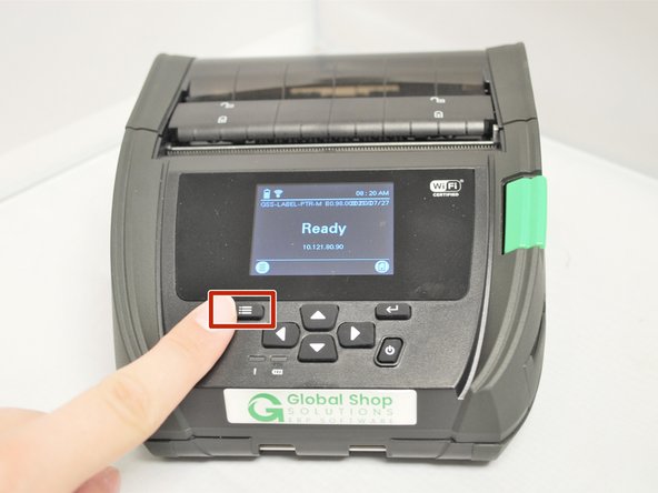 Select the 'Menu' option on the printer screen.