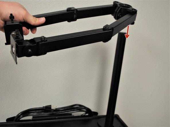 Slide the Swivel Arm over the Support Beam to the desired height.