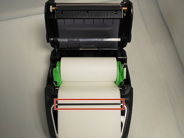 If the holder doesn't pull open easily, don't force it. Check that the locking switches on either side in the unlocked position - see Step 4 for more information.