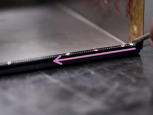 Use a flathead screwdriver to slide the retainer into the locked position on the standoffs.