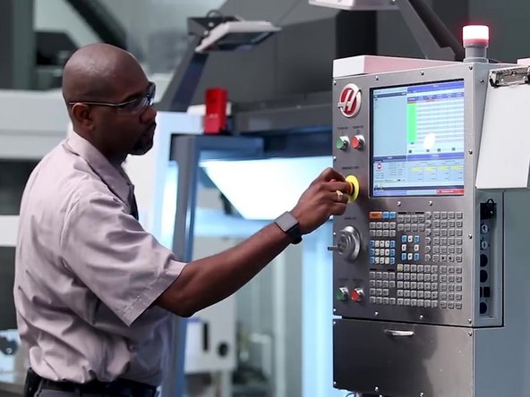 Release the E-Stop by pulling the Emergency Stop button outwards.