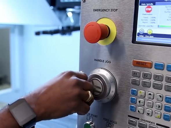 Jog the X-Aaxis to the end of travel by rotating the Handle Jog counter clockwise.