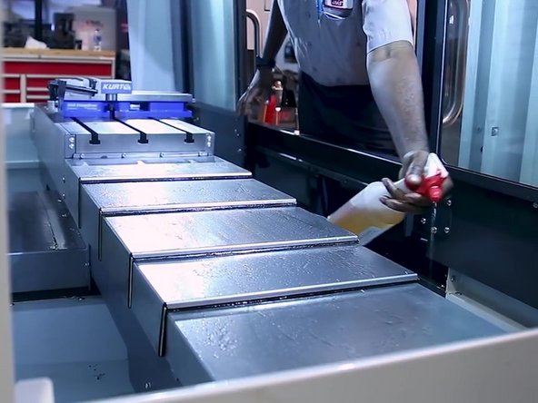 Apply a light coat of oil to all sections of the e-cover.