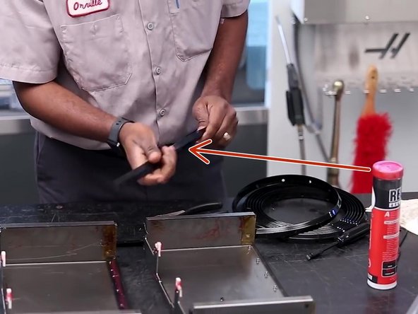 Apply a light coat of red grease to the new wiper.