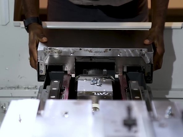 Install the waycover over the guide bars.