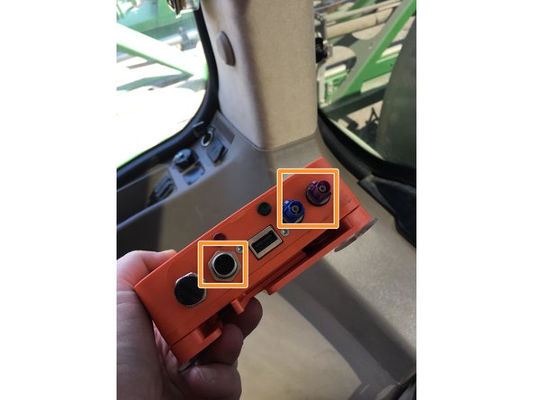 Plug in the diagnostic cable to the open port on the left side of the PUC.