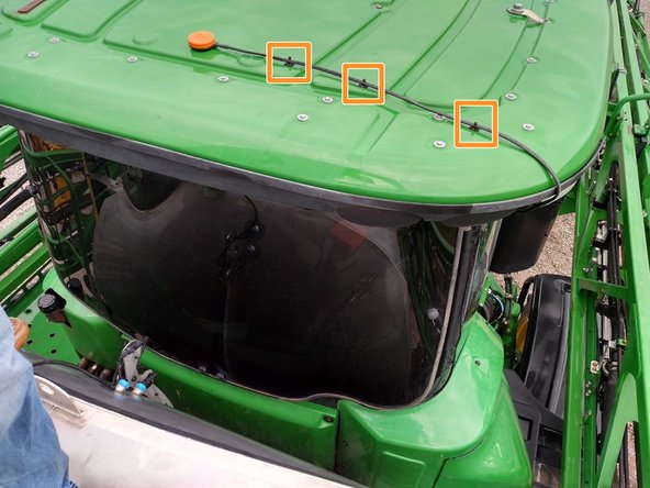 Slide cable ties into mounts.