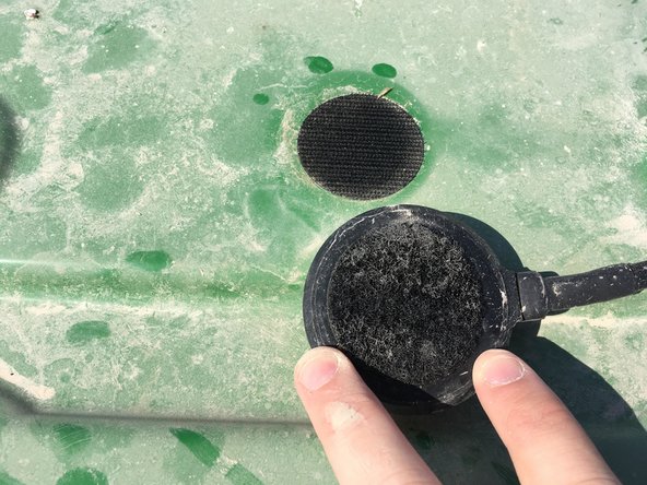 Place opposing side of Velcro on clean spot of cab.