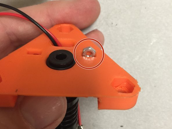 Insert the two M3 nuts into the nut traps in the top of the 3DAT0017 piece.