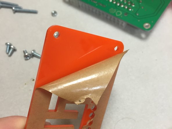 Peel off the acrylic cover from both sides of the PC02 plate.