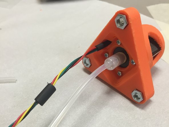 Use small (~6-8mm long) pieces of 3/16&quot; (~4.76mm) heat shrink tubing, and shrink these into place, approximately every 40-50mm (2in) along the length of the cable.