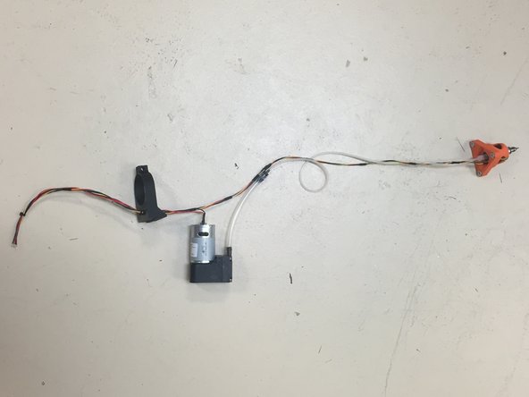 Thread the stepper motor wires through the hole in the 3DAT0005 mount (from the bottom, out the top).