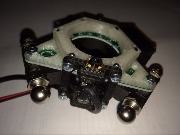 Attach the camera module to the end effector.