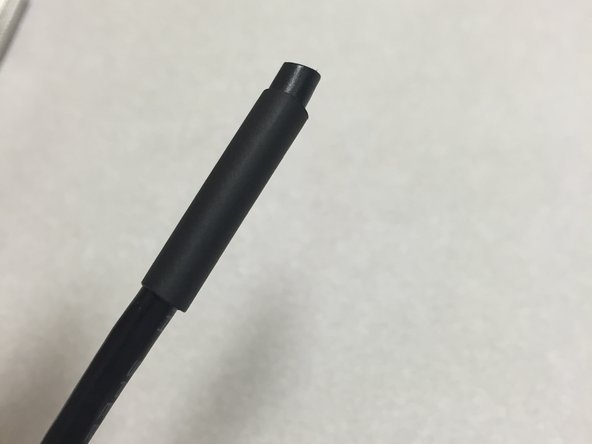 Slide on a piece of heat-shrink tubing.  Do this now before you forget!