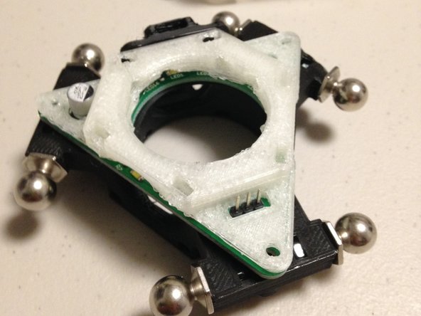 Install the 3DAT0011a ATC hub diffuser, over the LED ring light.  Use three M3 x 20mm pan-head screws, and three M3 nuts to hold the diffuser to the assembly.