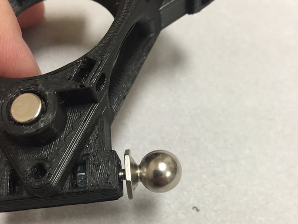 Insert the ball-studs into the ATC hub.  Screw them down until they are tight, but not so much where the plastic deforms.