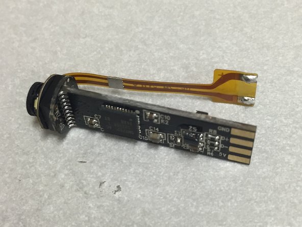 Heat the other side up, twist the other direction, and the cable should separate.