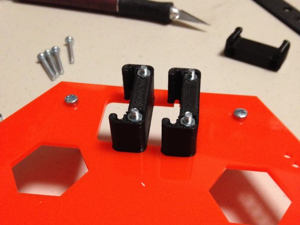 Add 3D0021 Modular tool card-cage pieces.  Use the FPAN-M3-20L screws and M3 nuts (2 per card cage)