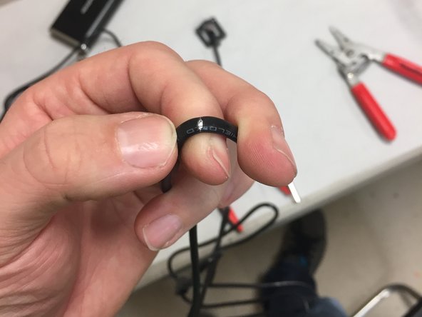 Some folks might have a coax cable jacket stripper in the toolbox.  This might work, but we've not tested it.  The X-acto method above works great for me.