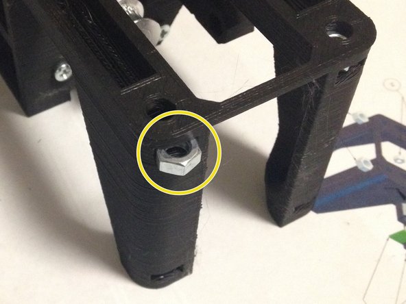 Insert M5 nut into top and bottom corners of frame.