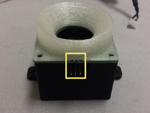 The diffuser will have three clearance holes for the ring light connector pins.  Make sure that these holes line up correctly.