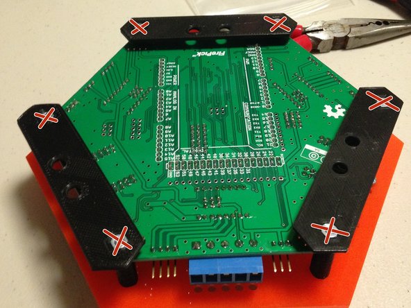 Note the orientation and position of the center holes in the mounting plate.