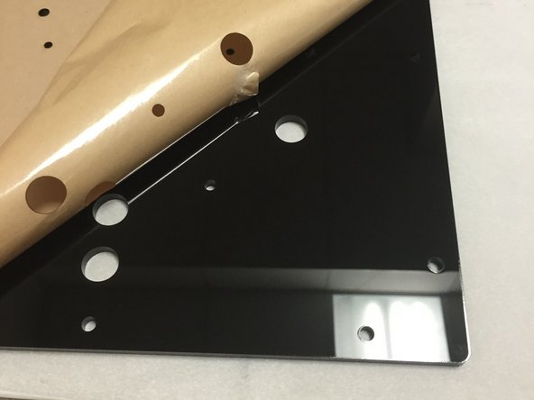 Peel off the protective brown adhesive coating on the acrylic piece(s).