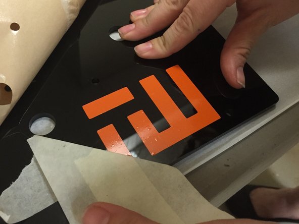 Remove tape backing.