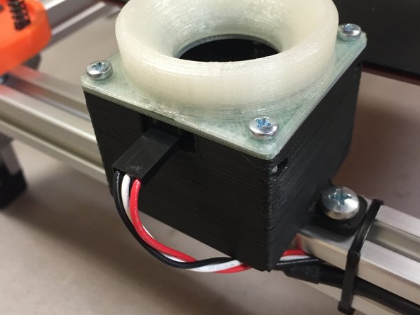 Mount the camera module on the frame using the included M5 x 10mm pan-head machine screws (NOTE: M5 x 10mm button-head cap screws will also work here, if you're building a barebones kit)