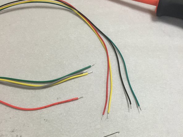 Strip and tin one end of the extra included wires.  Also strip and tin the end of the NEMA 8 stepper motor cable wires, if not done already.