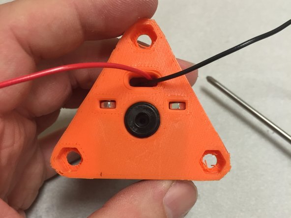 Insert the two M3 nuts into the nut traps in the top of the 3DAT0017 piece.
