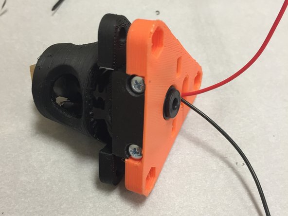 Place the 3D0024 3D printer mount body over the J-head.   The big open / overhang area should line up with the 3DAT0018A clamp.