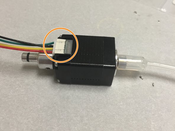 Plug in the stepper motor cable.