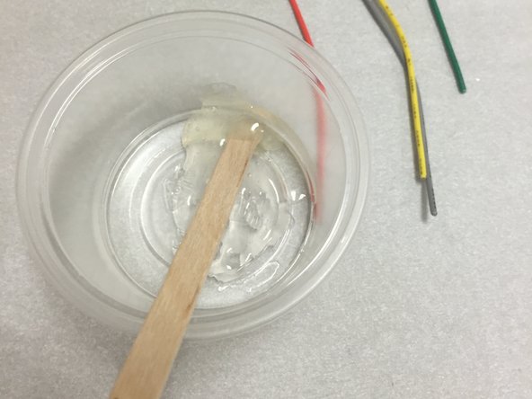 Mix up a bit of 2-part epoxy (not included in the kit).  General purpose clear epoxy should work fine, this can be purchased from any hardware store, and even most big-box stores in the hardware section.