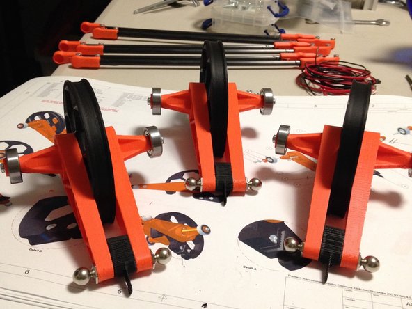 Repeat this guide until you've got three assembled pulleys, as shown.