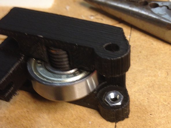 Place the FSET-M8-20L set screw into the DB608 bearing. Press this into the 3DAT004 3d printed piece.