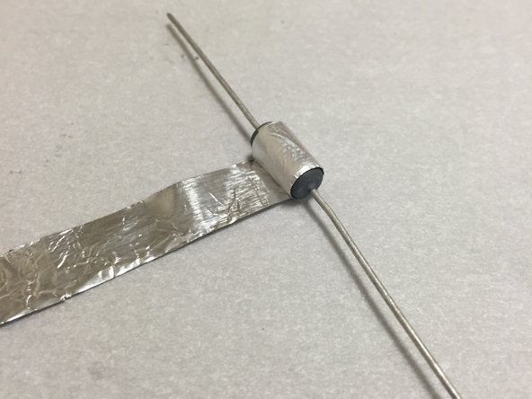 The solution is to either (A) wrap the resistor in aluminum foil, or (B) use fire cement.  Either are appropriate.  I'll show how to do this with aluminum foil, since it's the most common of the two.