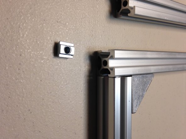 Insert the M5 extrusion nuts as follows: