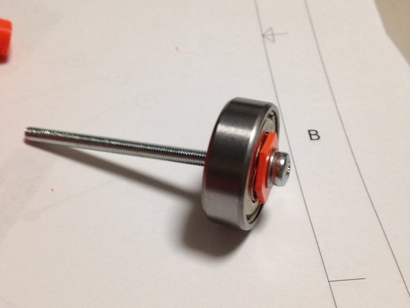 Place flat washer on M3-50mm screw