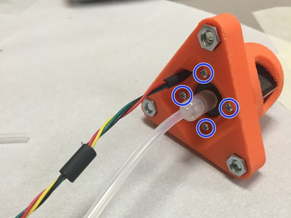 Insert the stepper motor into the 3D printed housing, making sure to insert the side with the M2 screw holes.